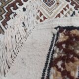 White carpet with multicolored Berber patterns handmade