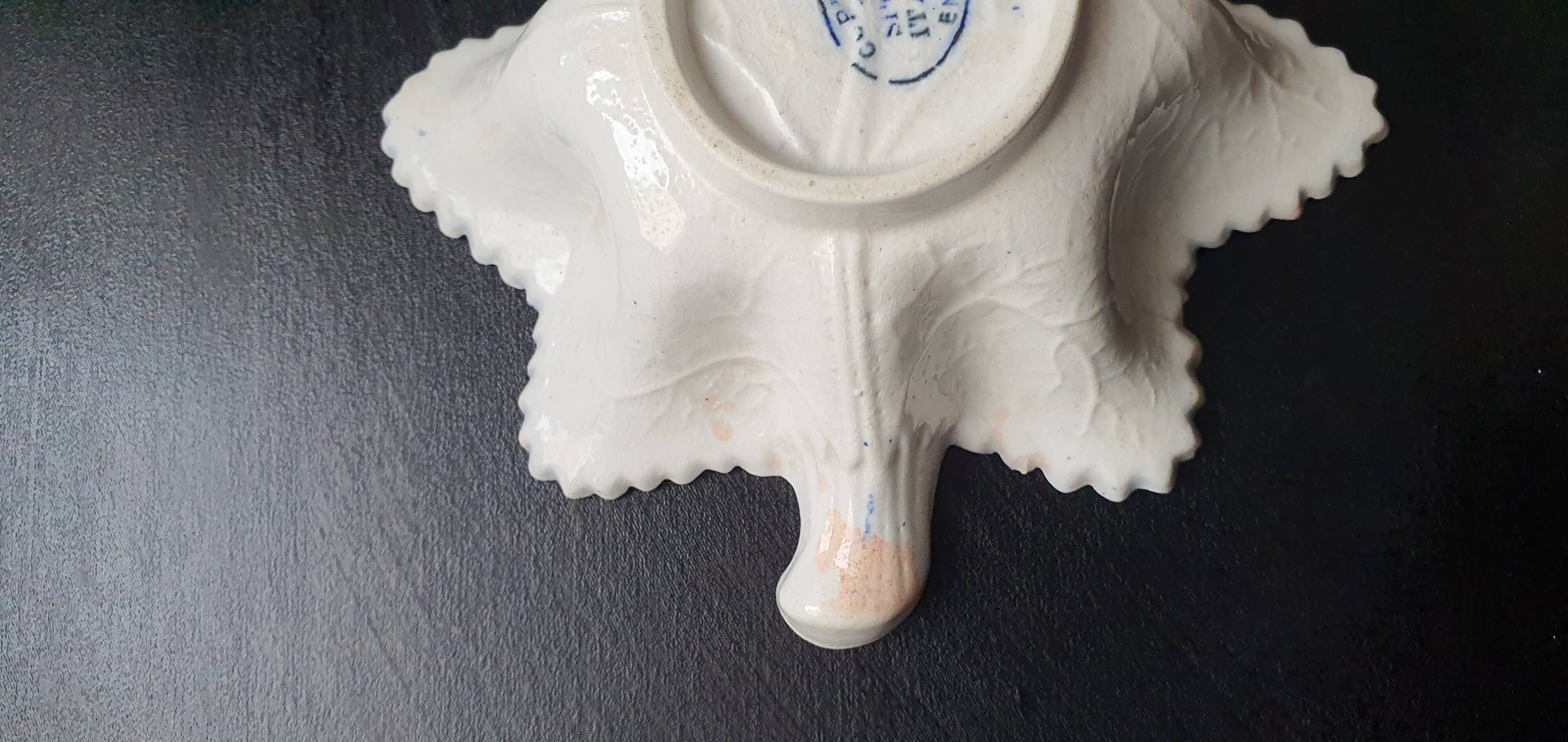 Copeland pickle dish in the shape of a leaf in blue earthenware.