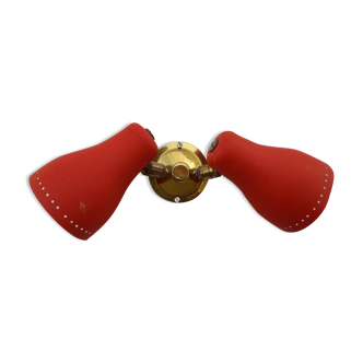 Sconce in red metal and brass grainy appearance