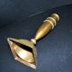 Antique baluster candlestick in bronze with hand-chiseled design.