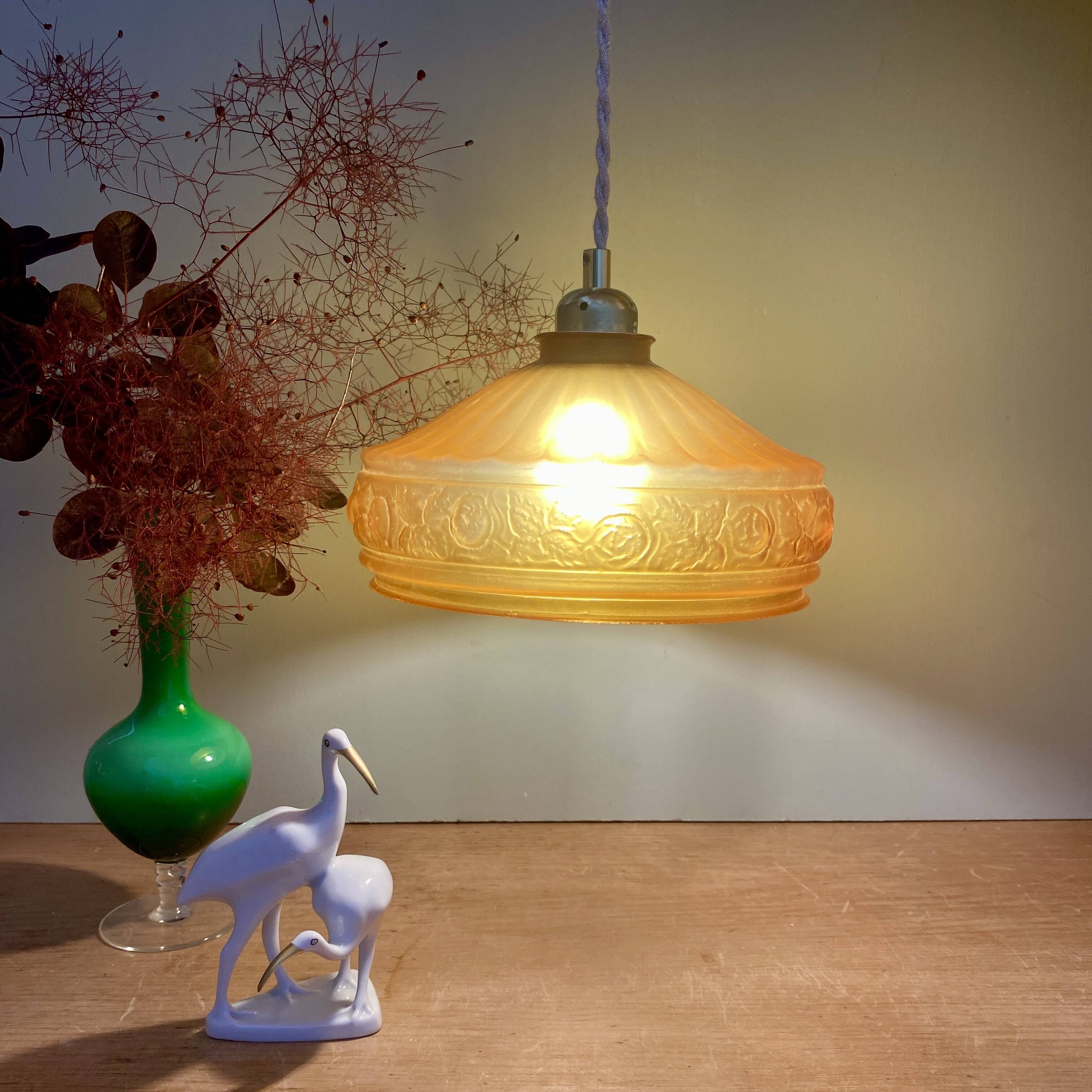 Pendant light with old art deco lampshade in yellow glass