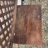 Headboard and its two wooden bedside tables.