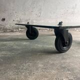 Gae Aulenti coffee table for Fontana Arte, transparent glass top with black cast iron supports, 1980s.