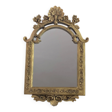 Baroque style mirror, decorated with shells and flowers.