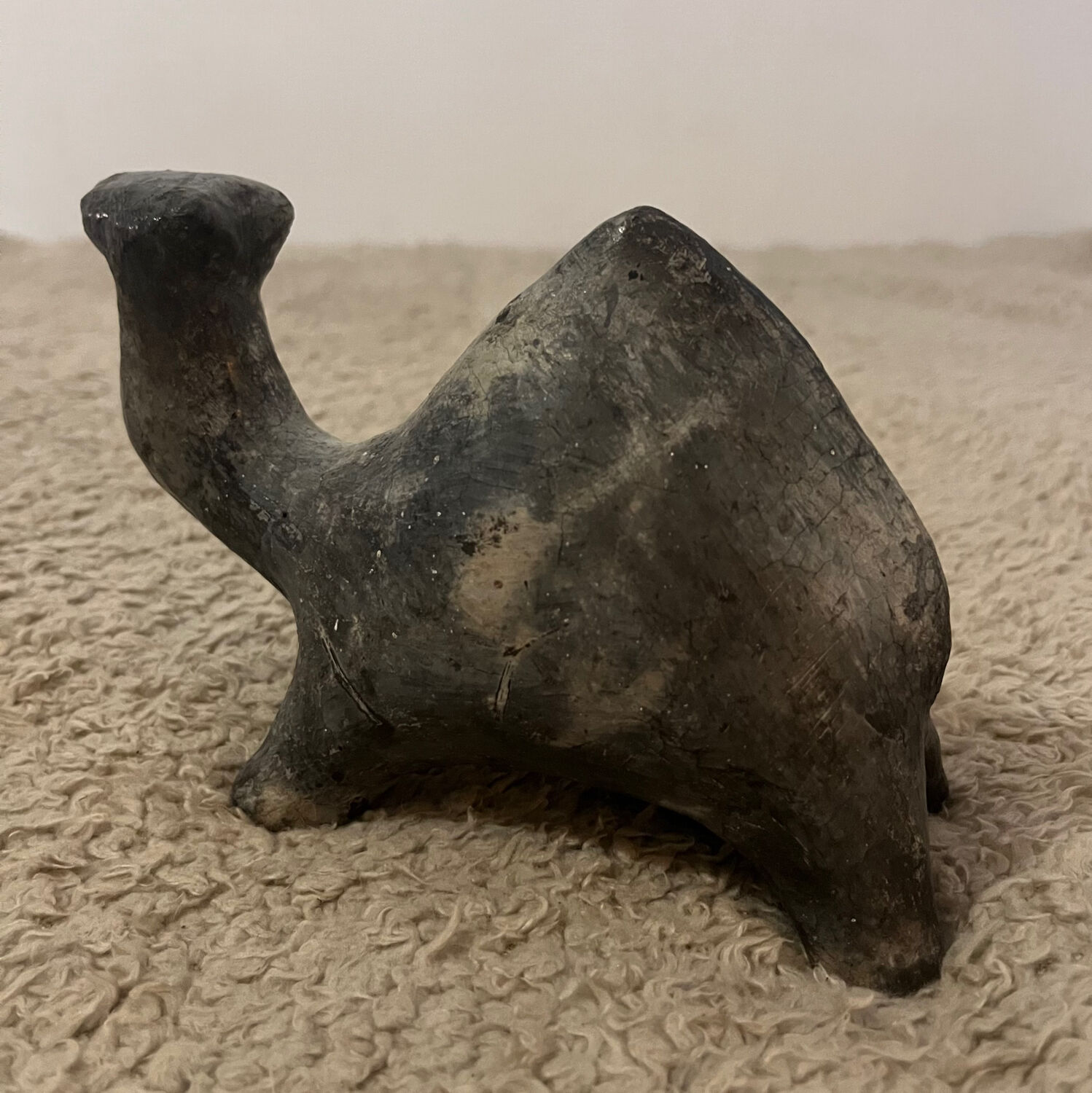 Ceramic camel statuette