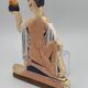 Women's cast iron subject 1930 art deco signature to identify polychrome