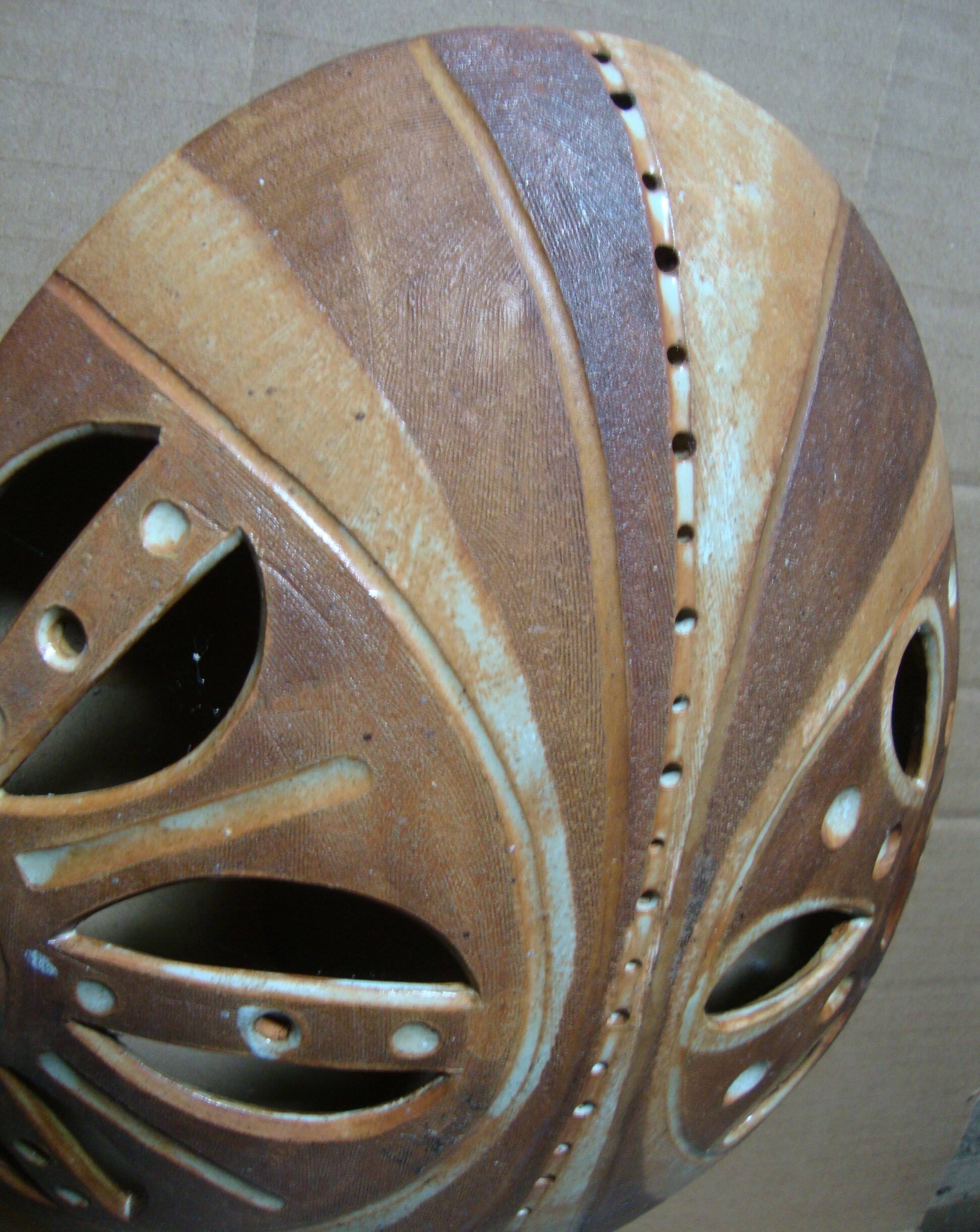 Ethnic ceramic wall lamp signed.