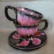 2 vintage cups and saucers