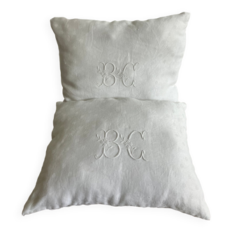 Pair of embroidered cushions, BC monogram