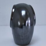 Two iridescent black and white ceramic elephants design