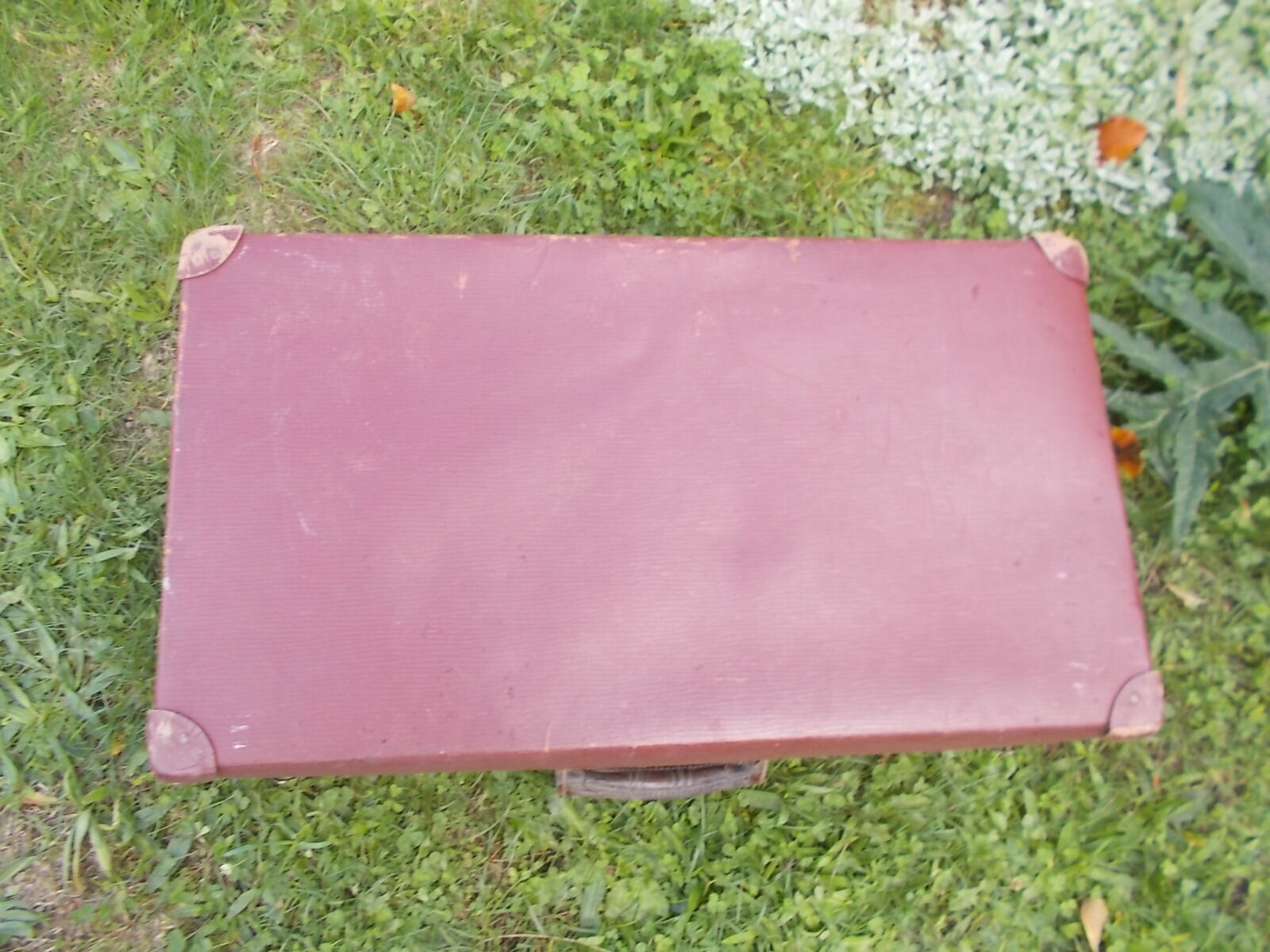 Vintage burgundy suitcase