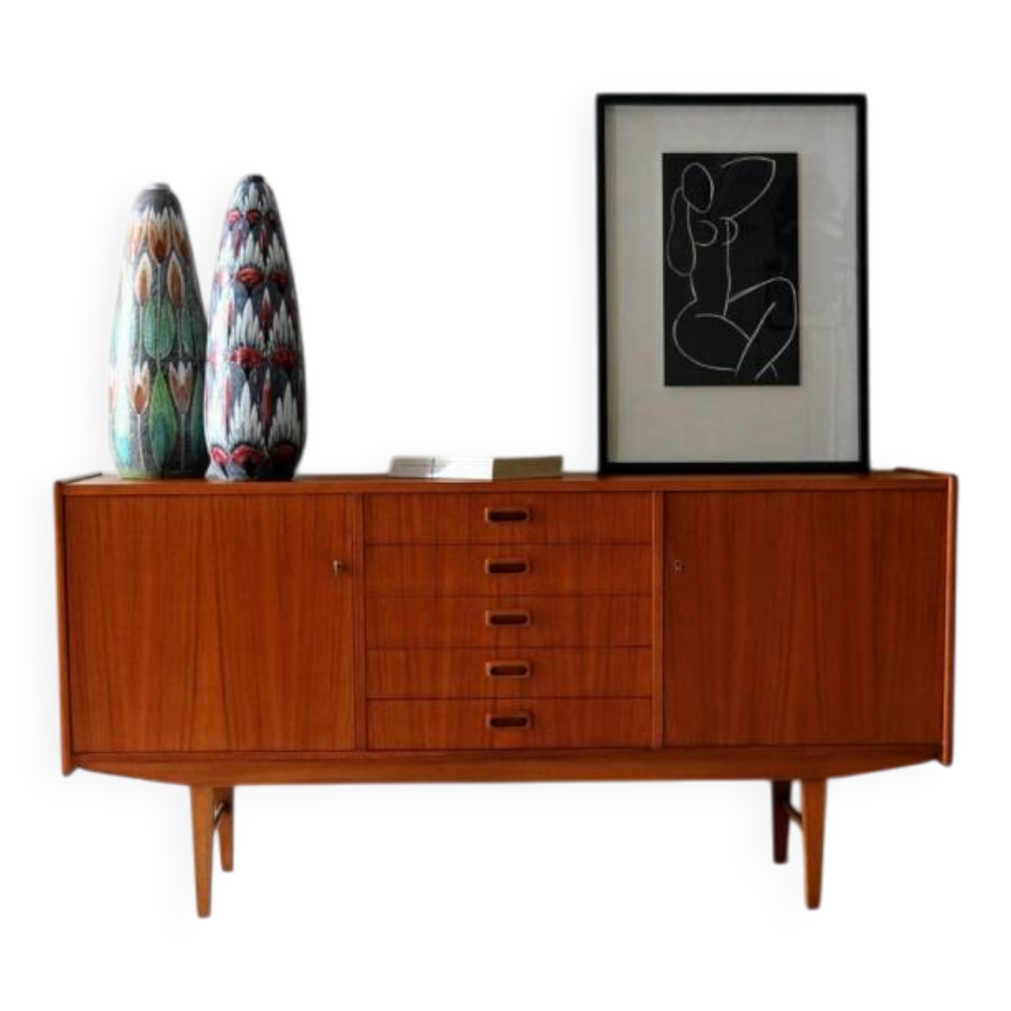 Danish sideboard in teak with central drawers. Denmark, late 1950s