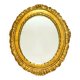 Antique oval mirror in gilded wood