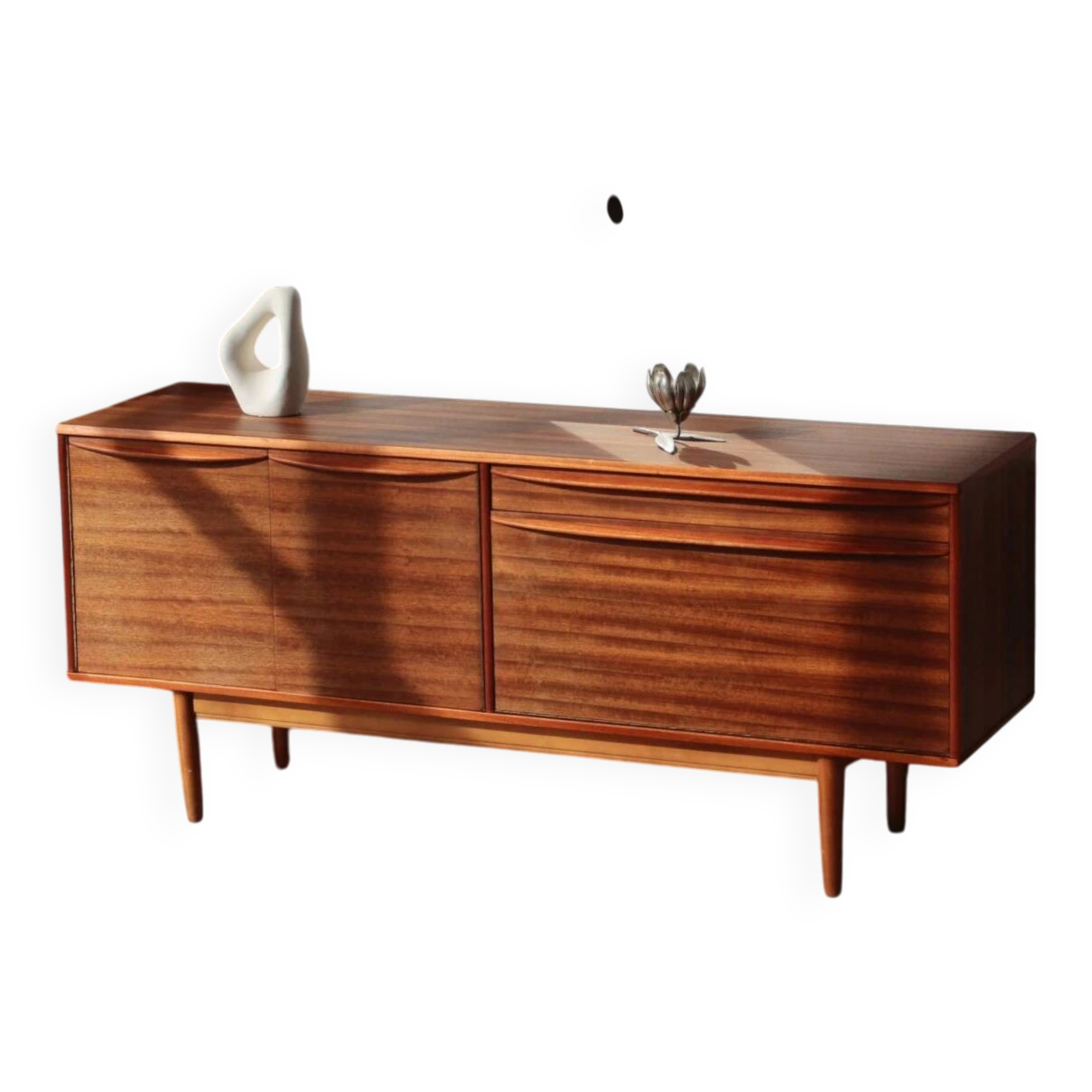 Vintage zebrano and walnut furniture from Morris of Glasgow.