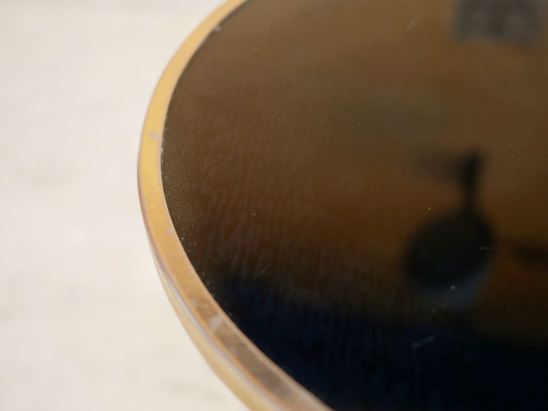 Vintage gold metal and black glass tray side table