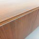 Vintage modernist enfilade in rosewood and chrome metal from the 60s and 70s.