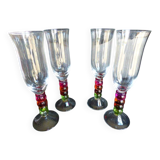 4 vintage flutes with coloured glass stems