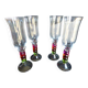 4 vintage flutes with coloured glass stems