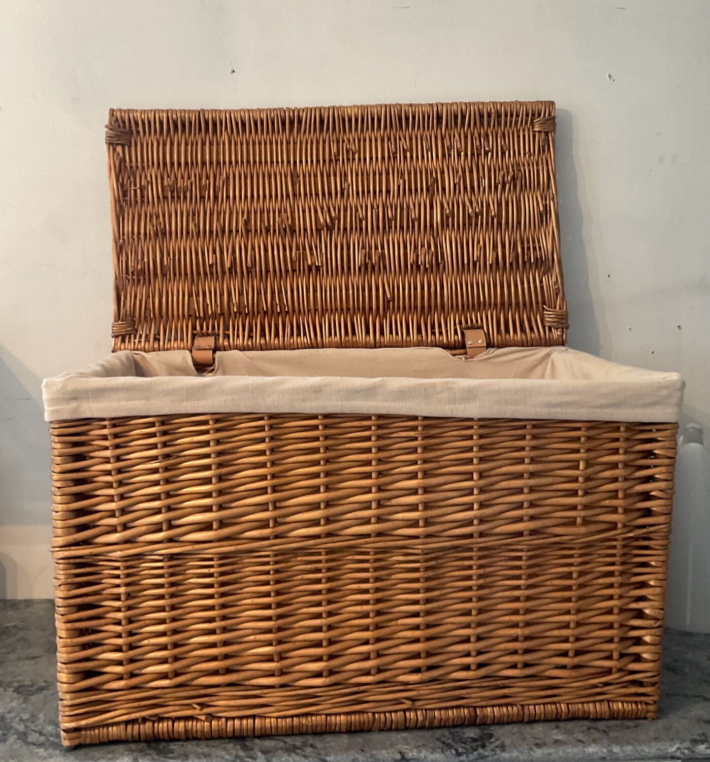 Woven wicker vintage suitcase