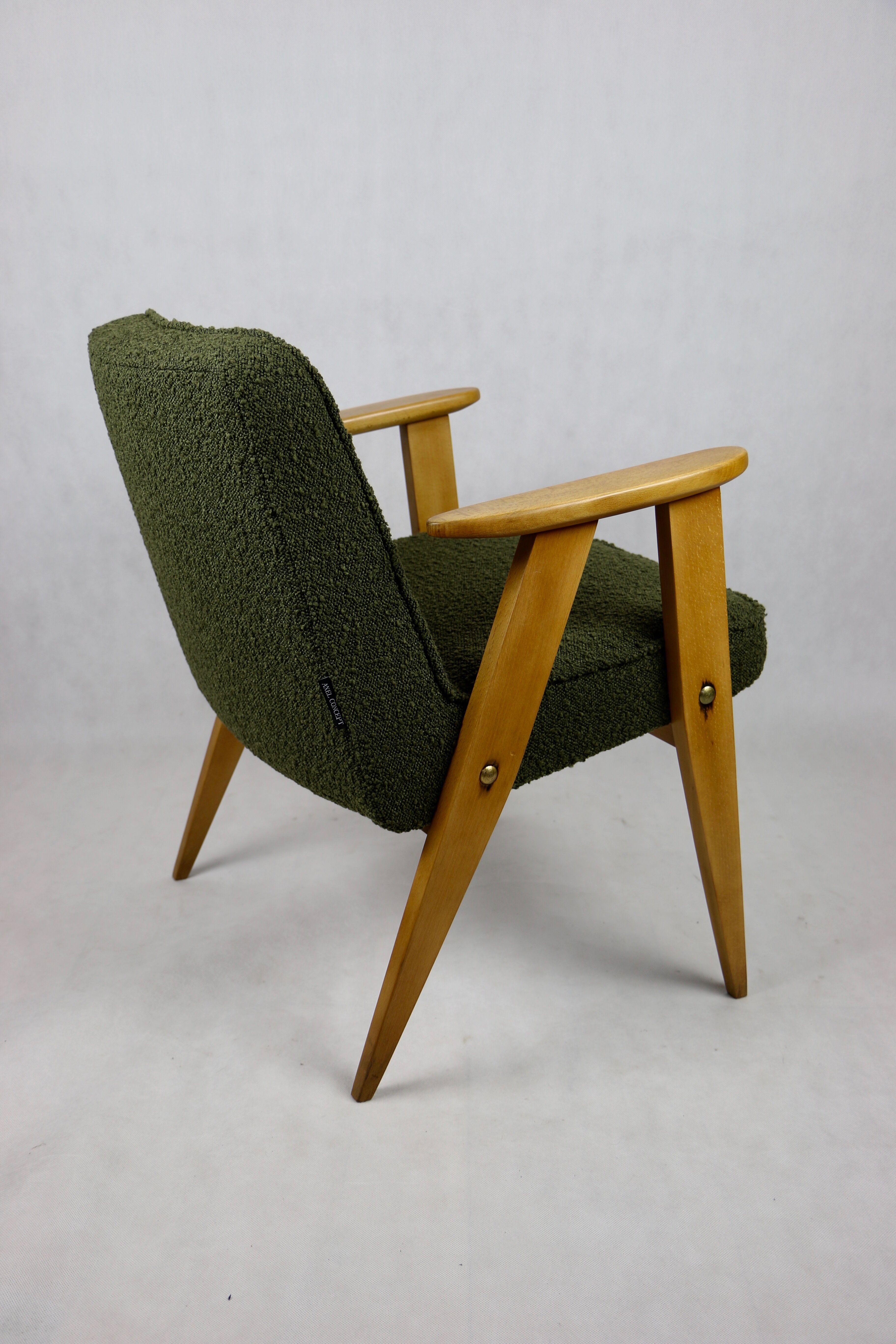 366 olive boucle armchair, 1970s