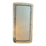 Asymmetrical free-form mirror from the 1970s