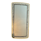 Asymmetrical free-form mirror from the 1970s
