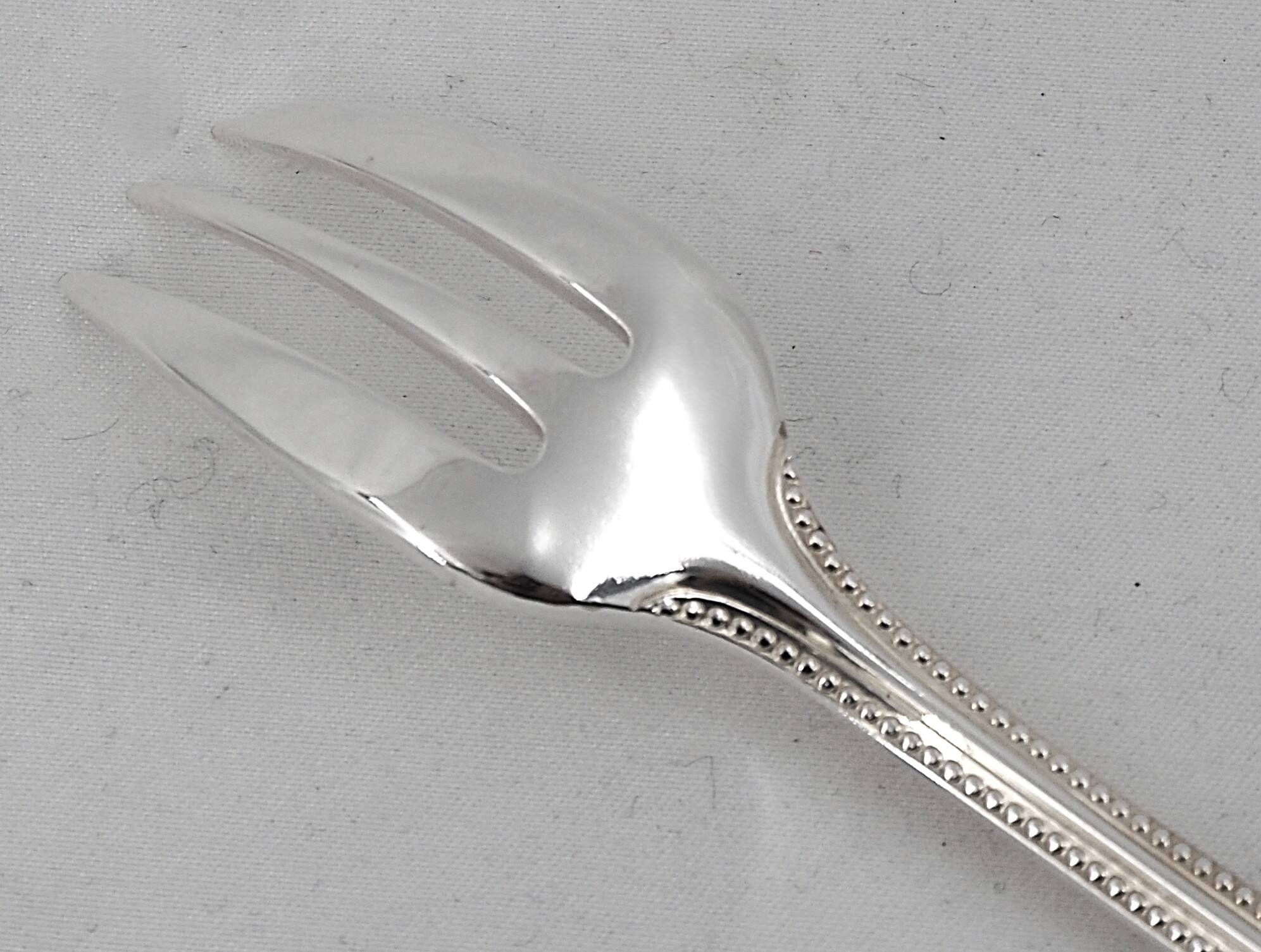 Christofle Perles 12 silver-plated cake forks, excellent condition.