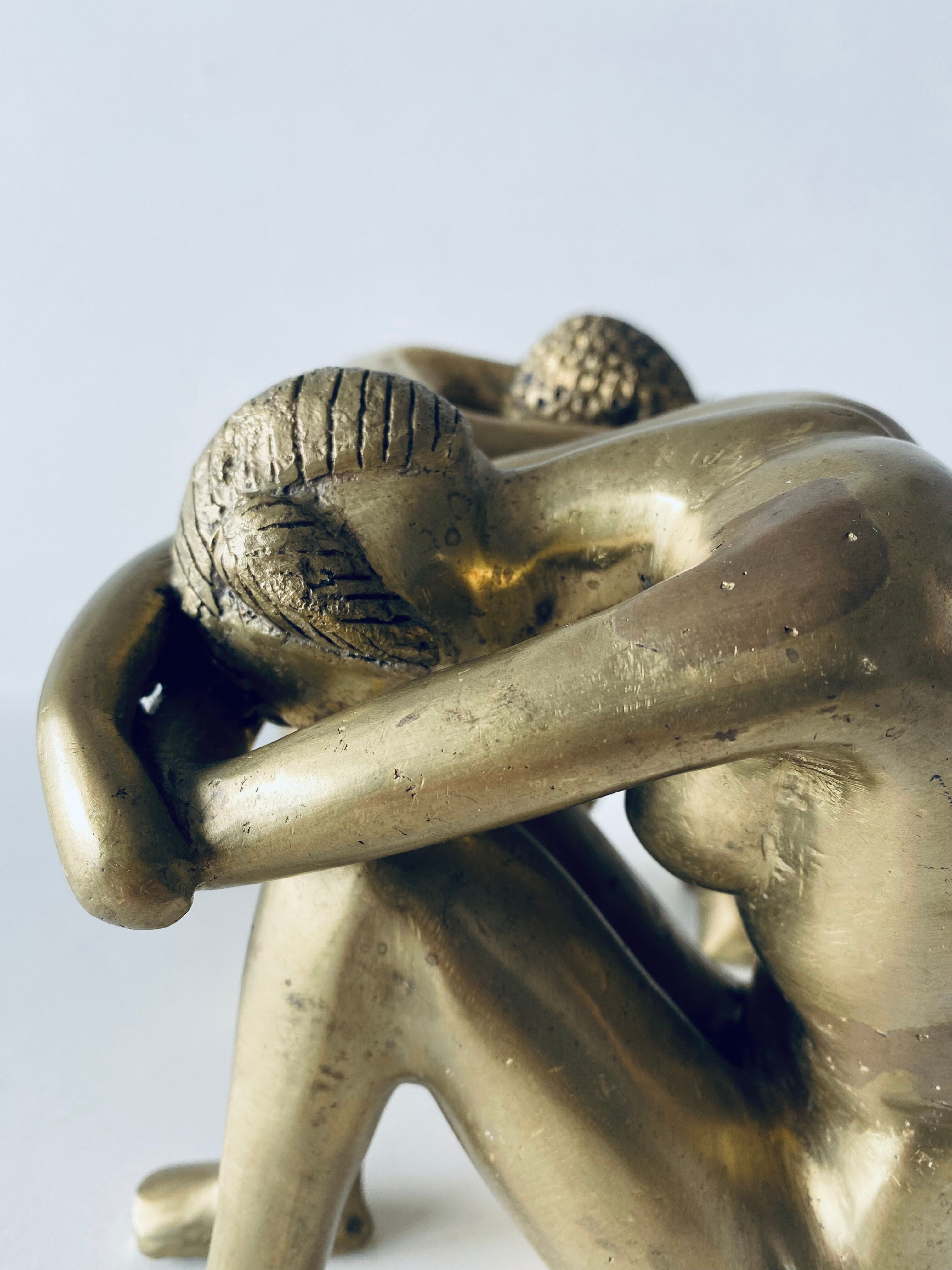 Couple carved in gilded bronze