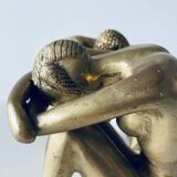 Couple carved in gilded bronze