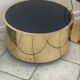 2 bedside tables and a brass Fendi table.
