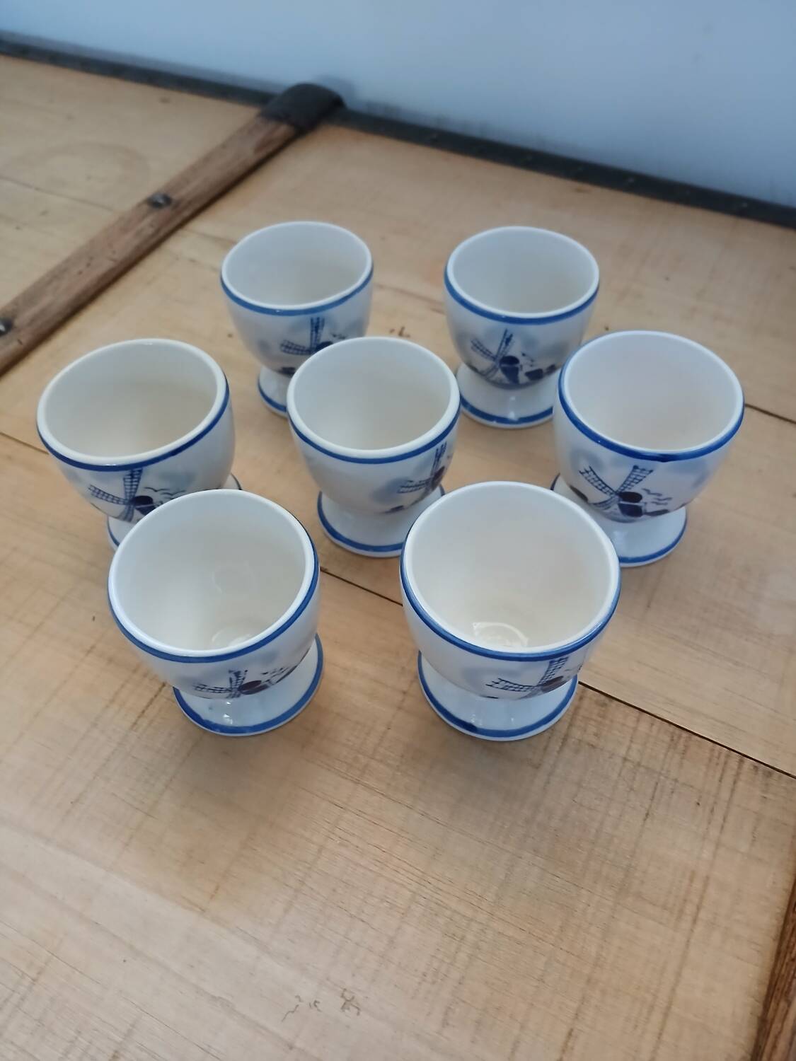 7 antique egg cups