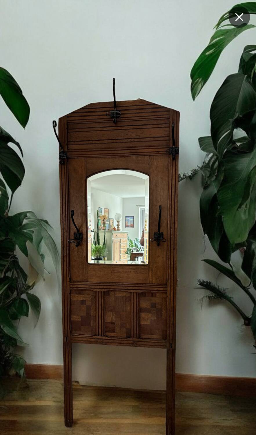 Wooden and wrought iron coat rack
