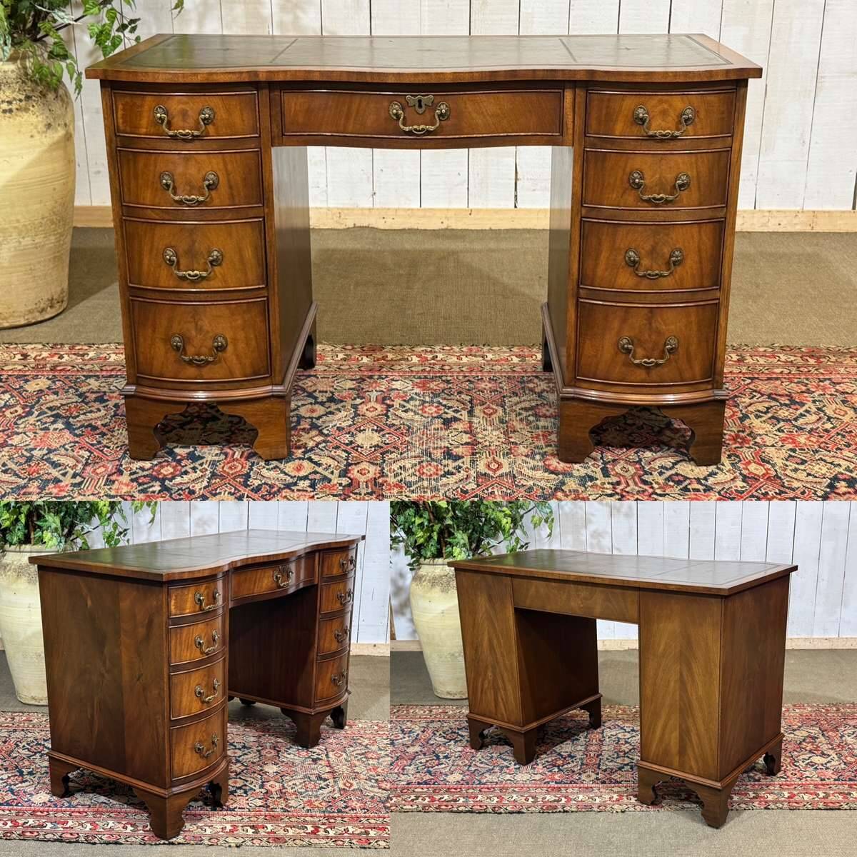 English desk from the 1950s in mahogany with a leather top.