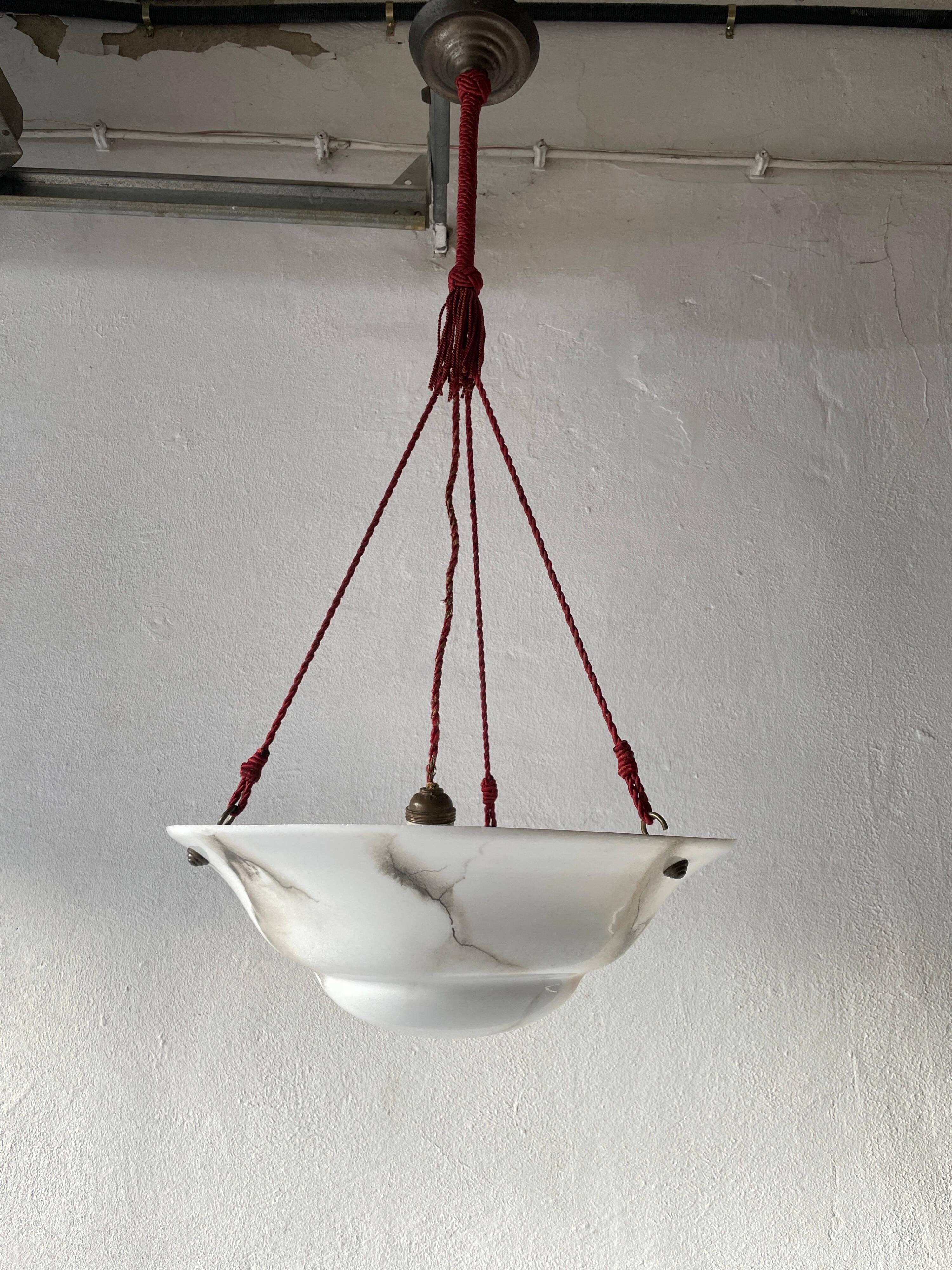 Art Deco suspended lamp in white marble-effect glass, 1940s, Germany.