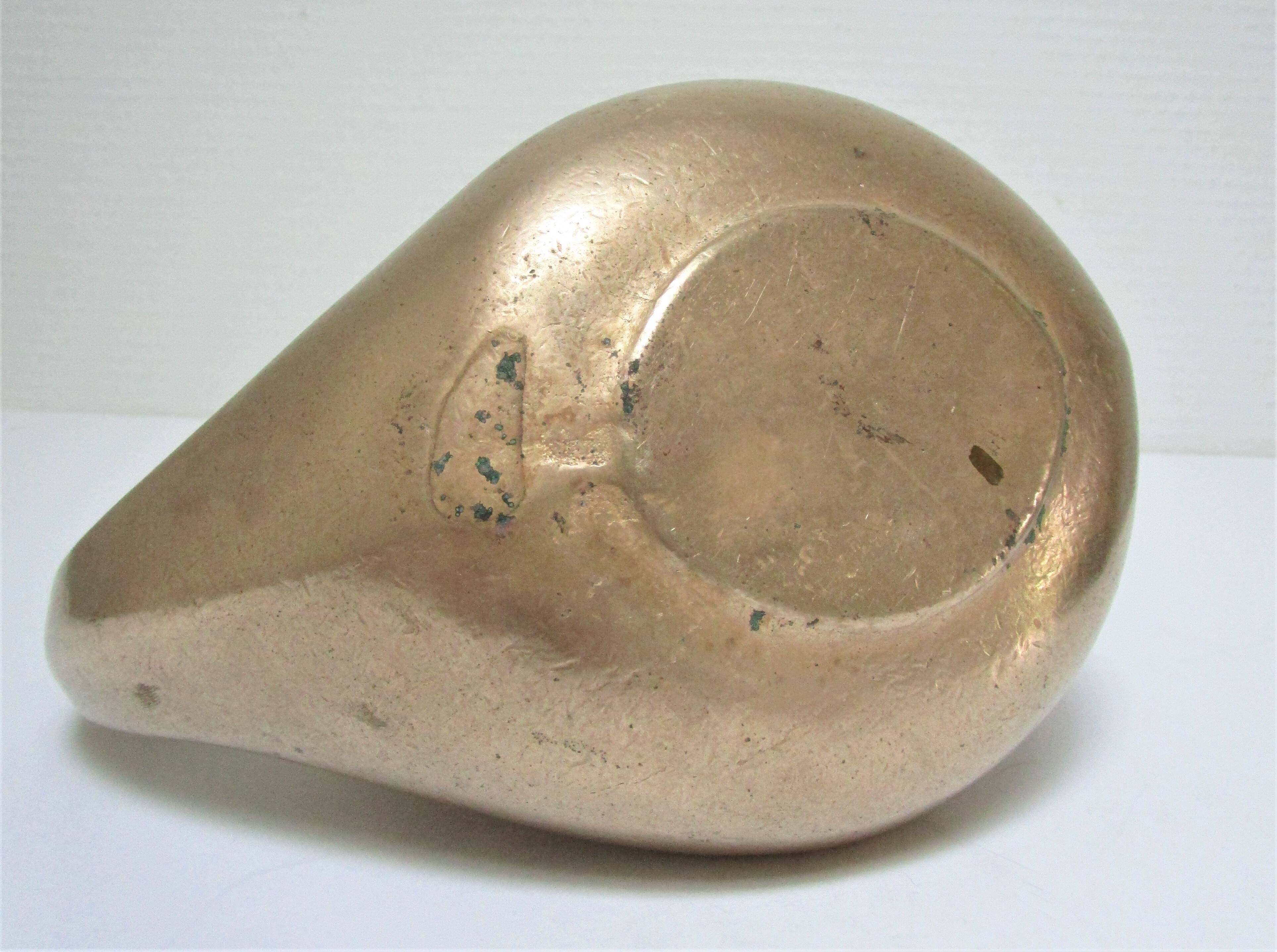 Stylized sculptural solid brass vase with handle