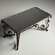 Wrought iron coffee table with mirror glass