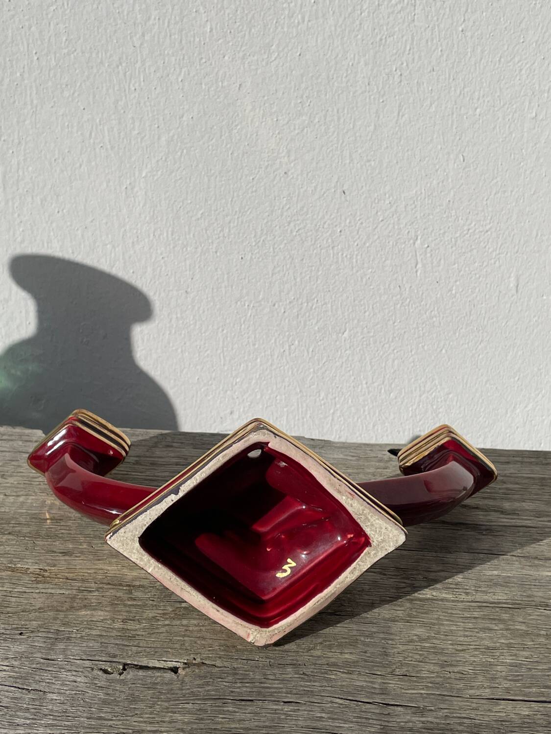 Art Deco burgundy red ceramic candlestick
