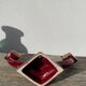 Art Deco burgundy red ceramic candlestick