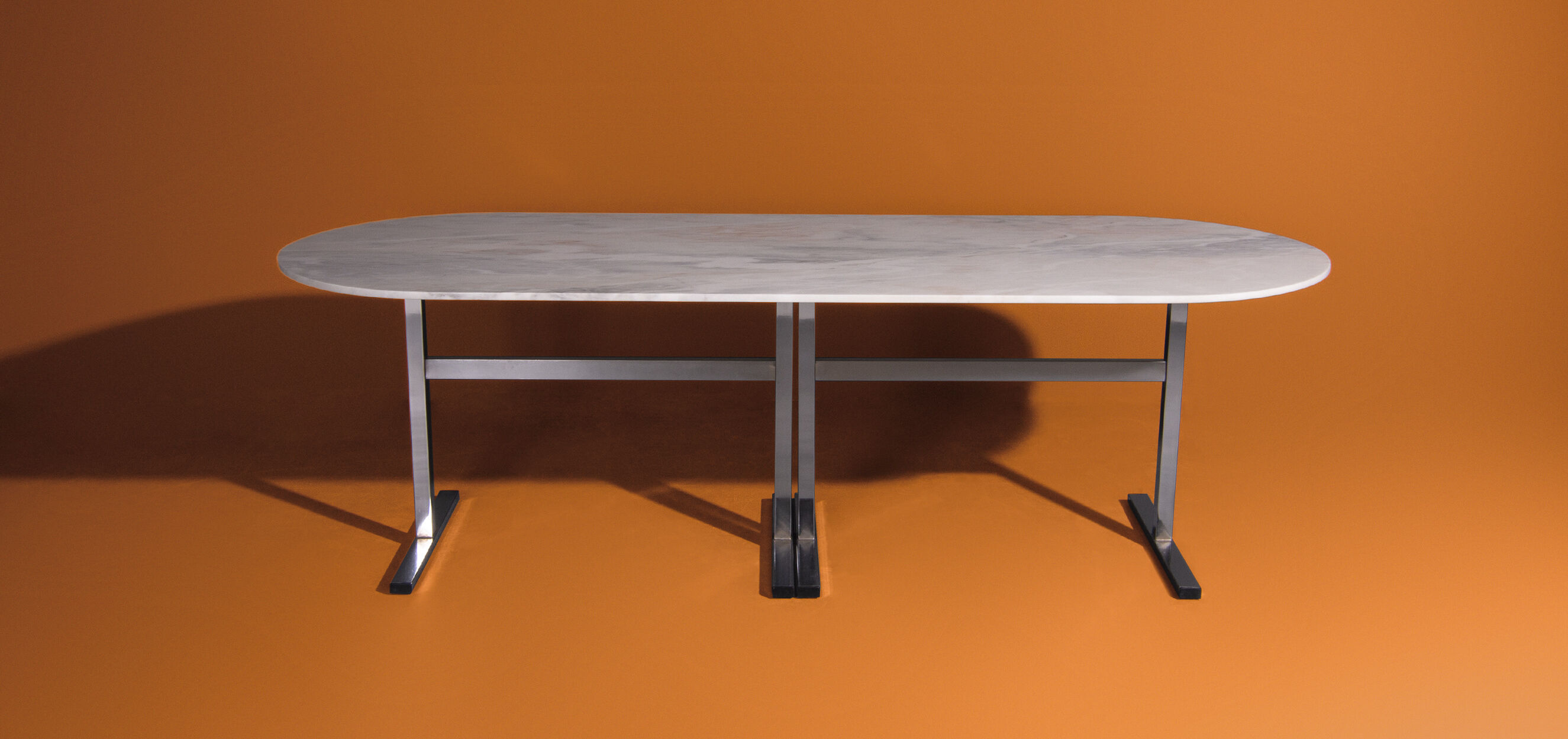 Dining table with oval Carrara marble top