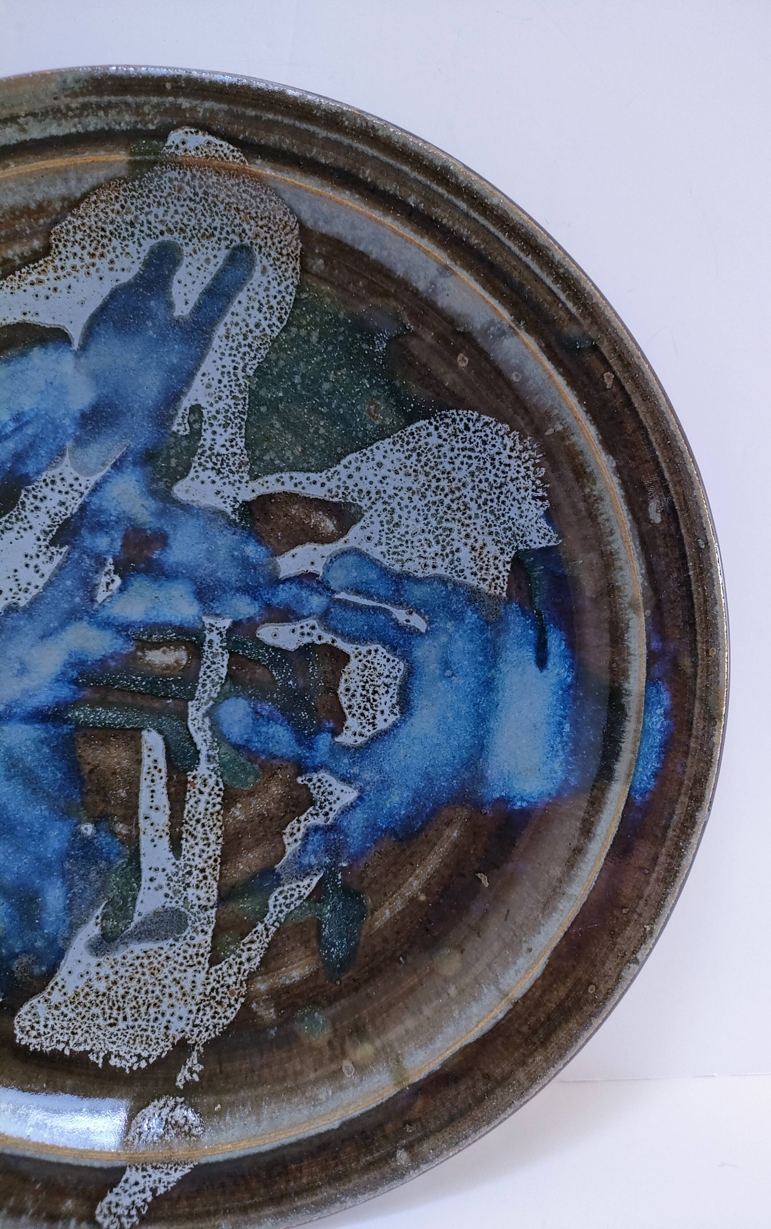 large enamelled stoneware plate signed mcb la borne