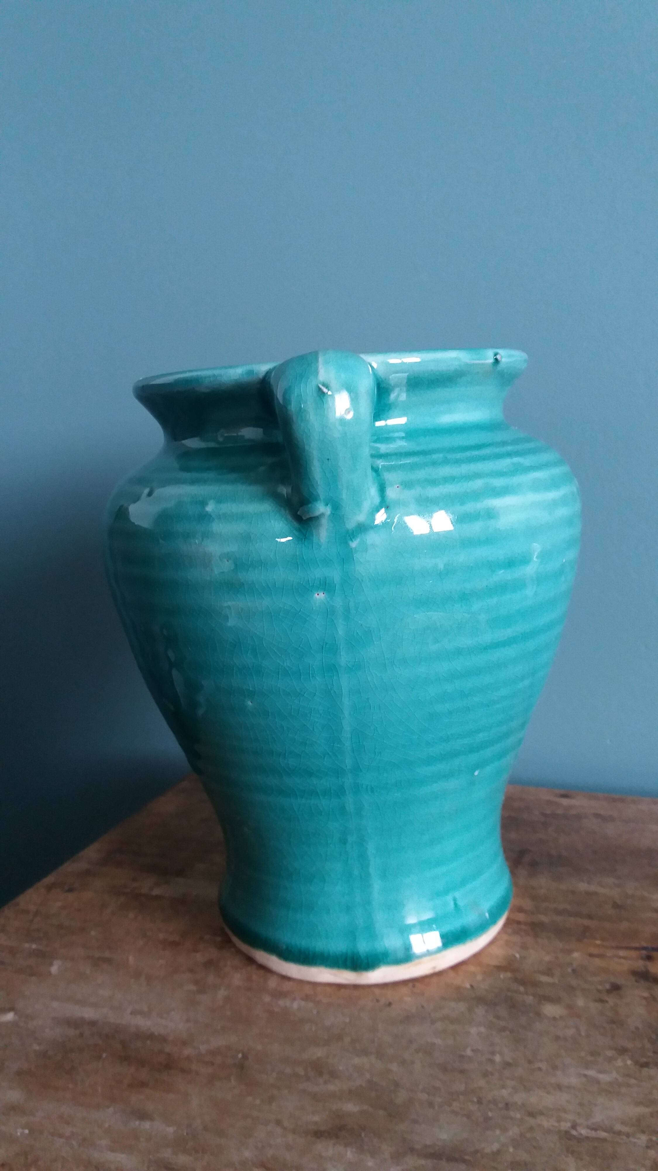 Glazed green-blue ceramic vase