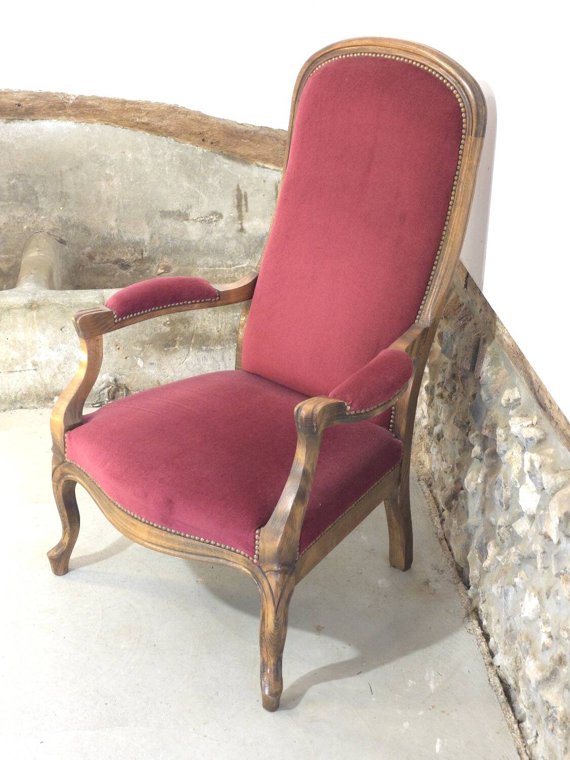 Voltaire red velvet armchair