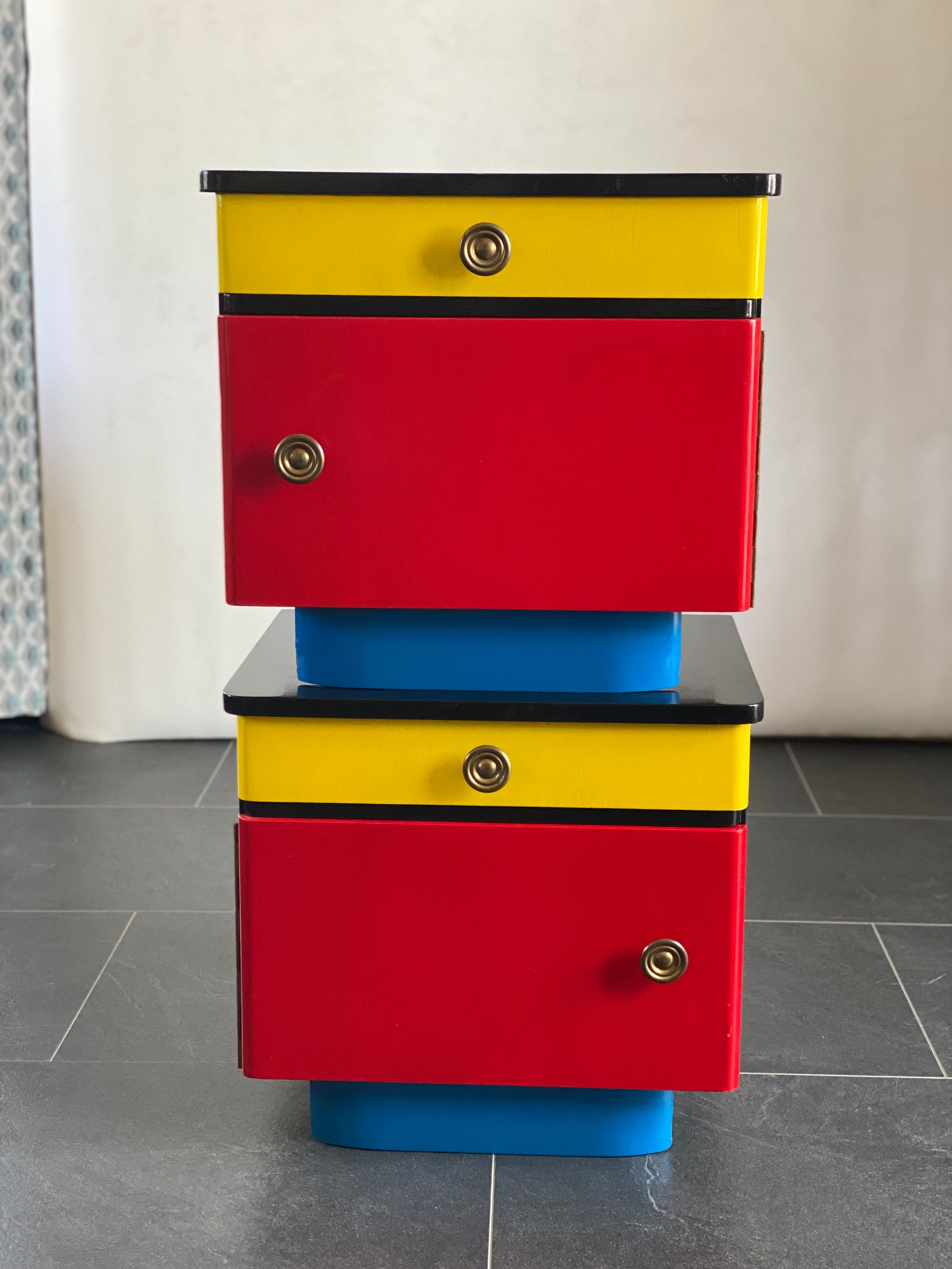 Pair of colorful massive teak night stands