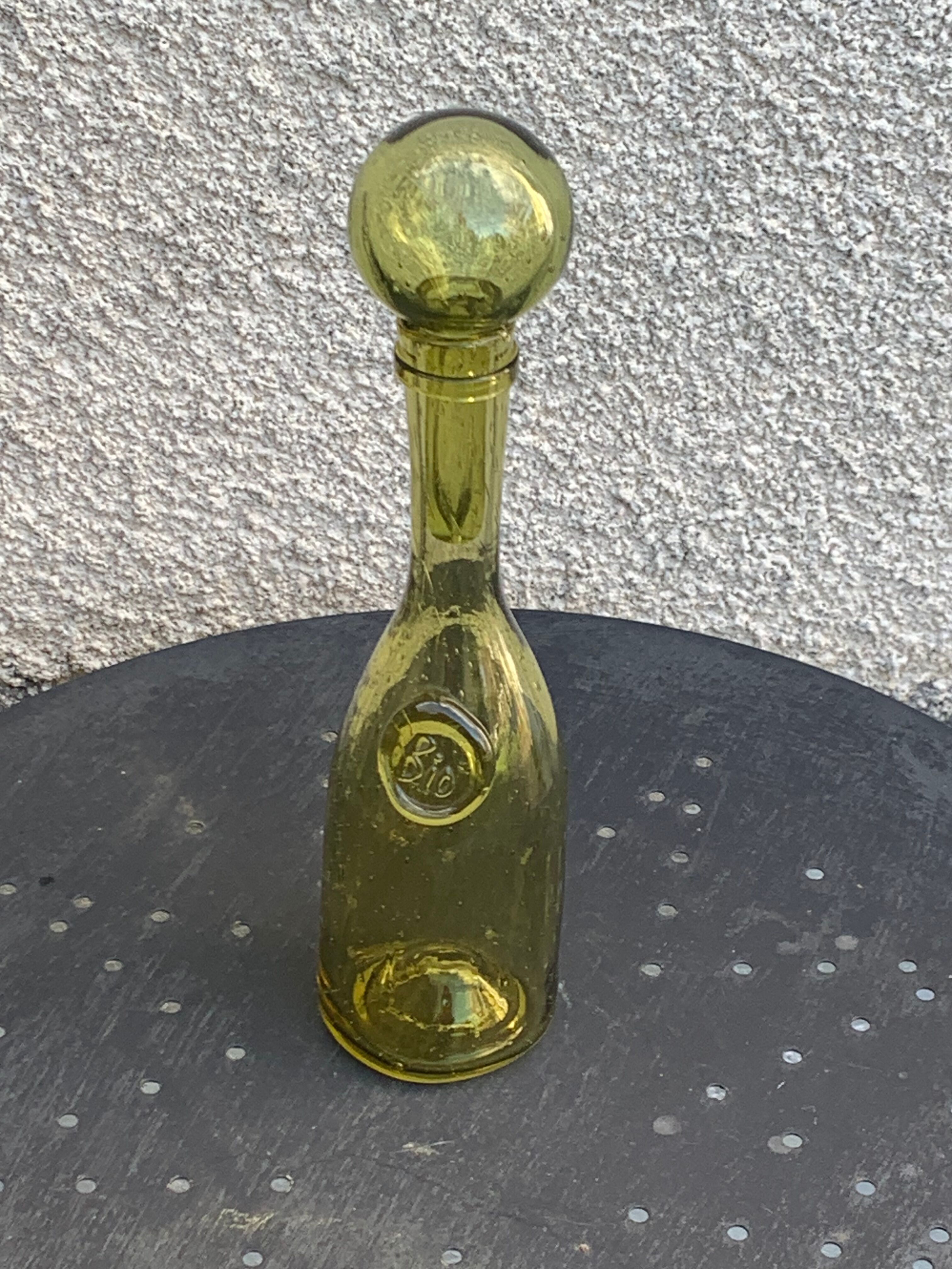 Glassblown glass decanter from the Biot collector glassworks
