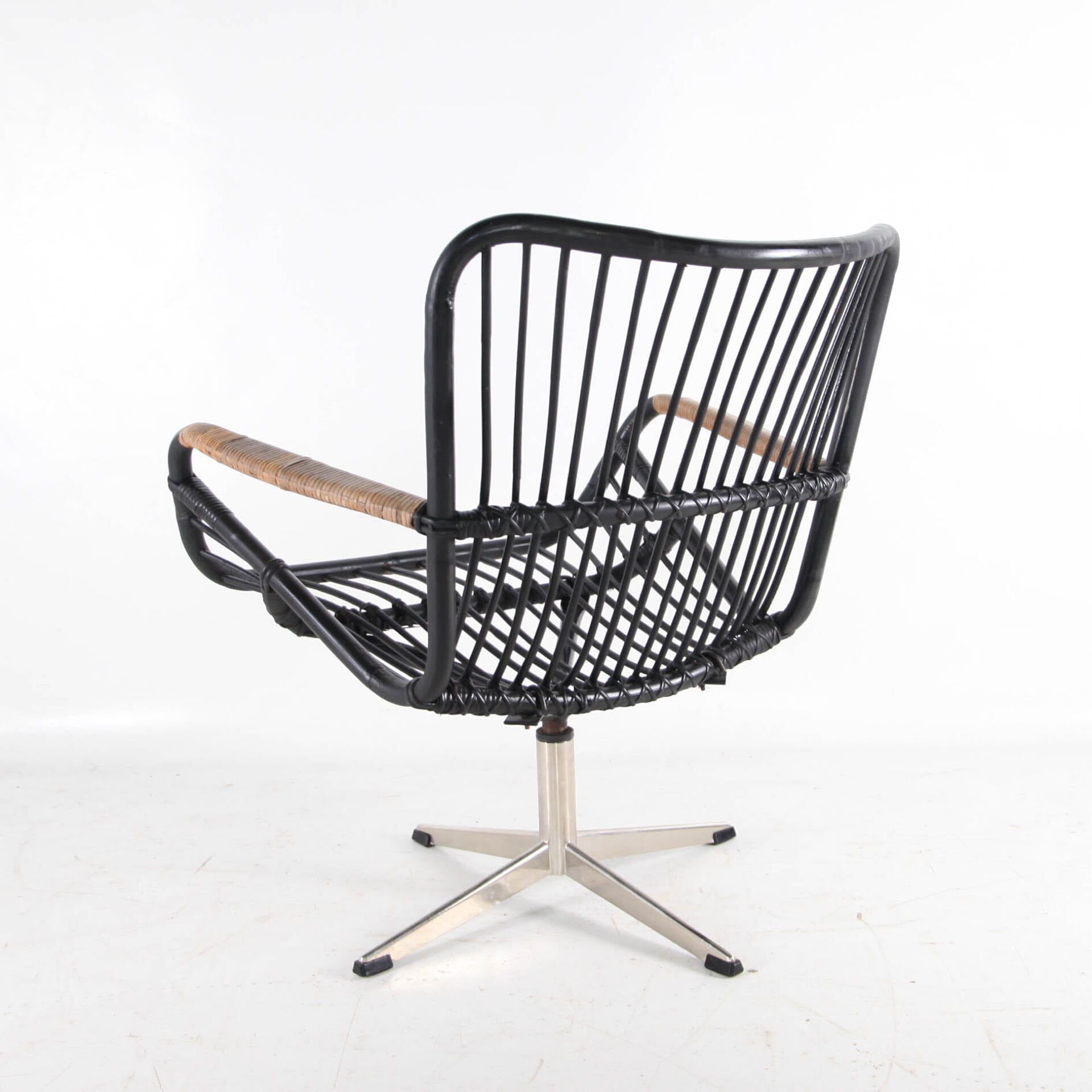 Rattan and chrome armchair