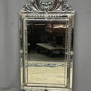Antique Venetian mirror.