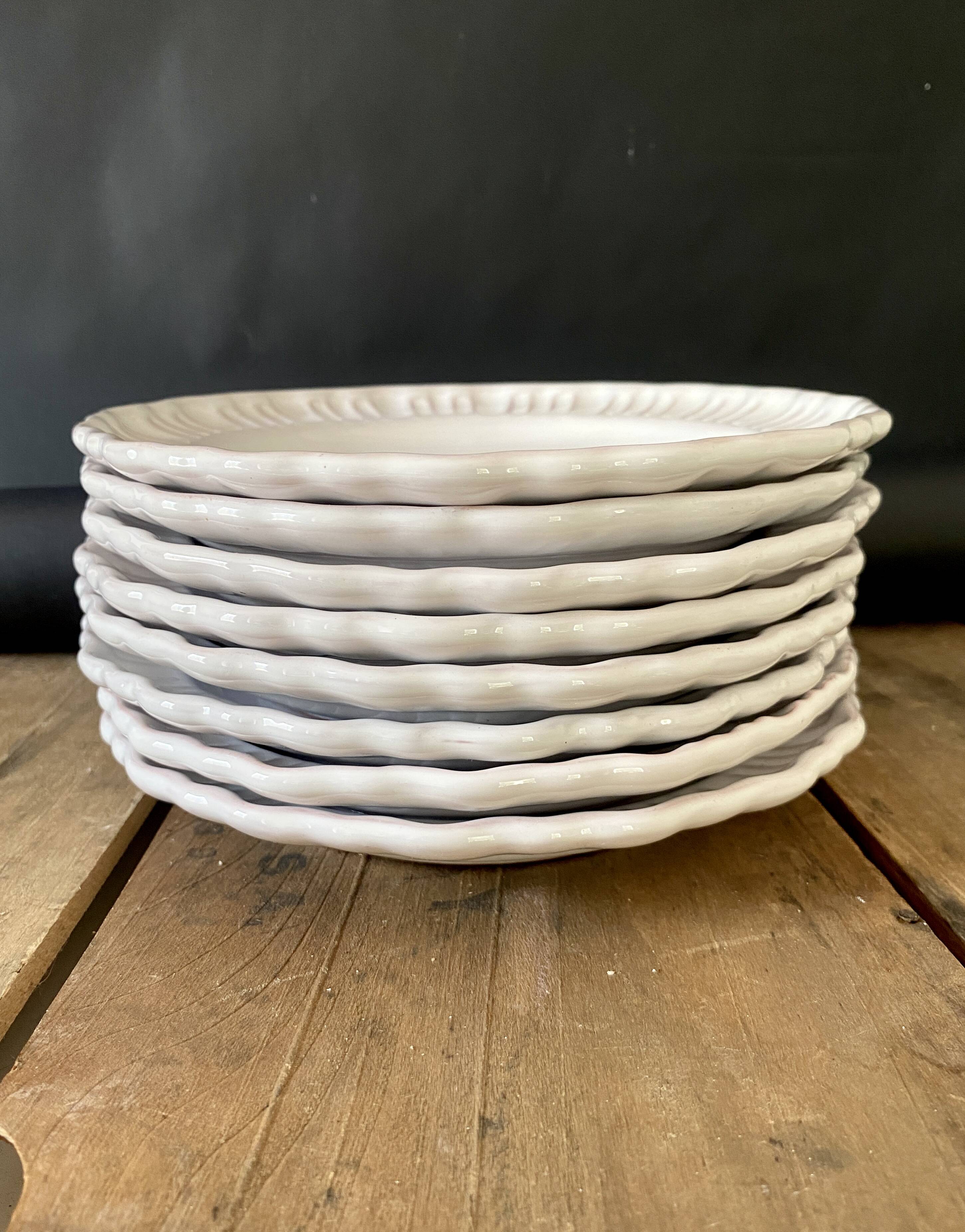 8 Provençal enamelled earthenware plates