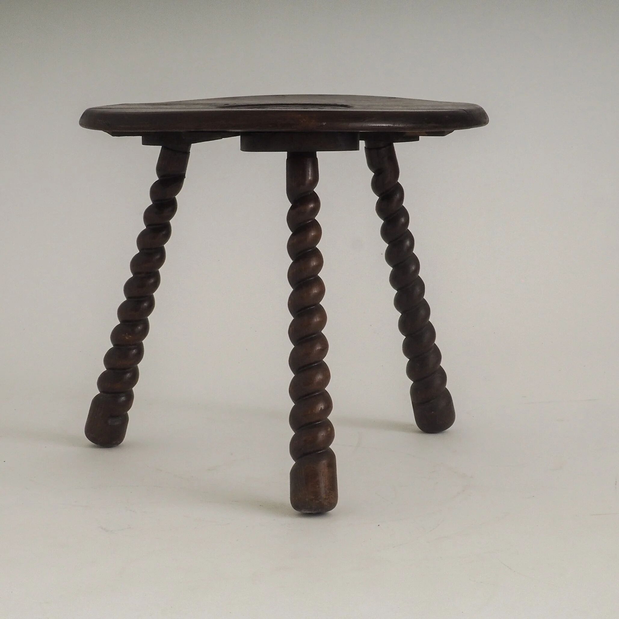 French oak tripod side table attributed to Charles Dudouyt