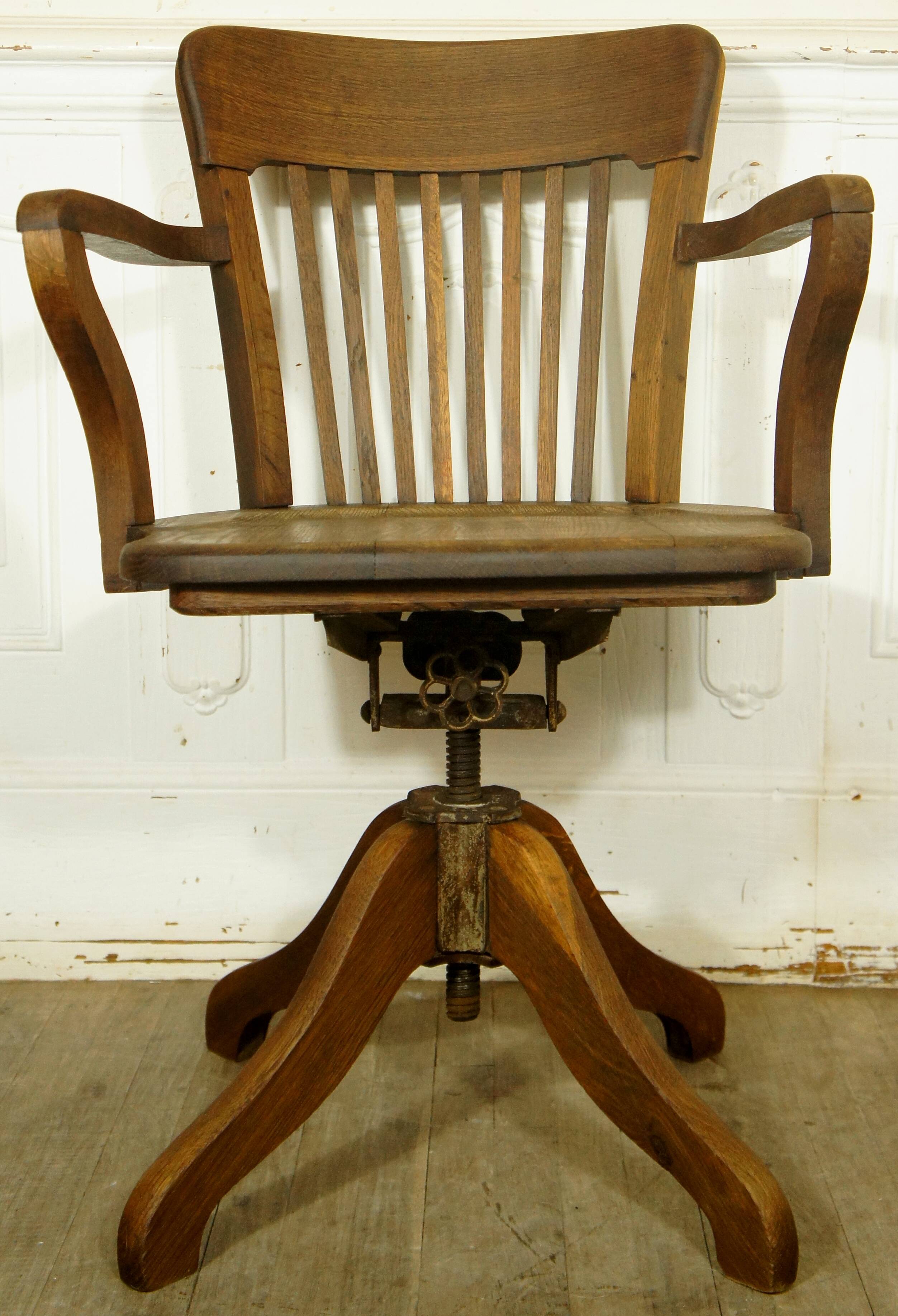 American solid oak armchair, swivel 360 °, tilting & adjustable in height. c. 1920