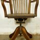 American solid oak armchair, swivel 360 °, tilting & adjustable in height. c. 1920